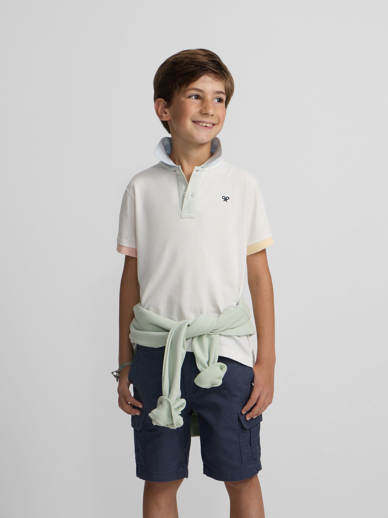 Polo kids ribete multicolor blanco
