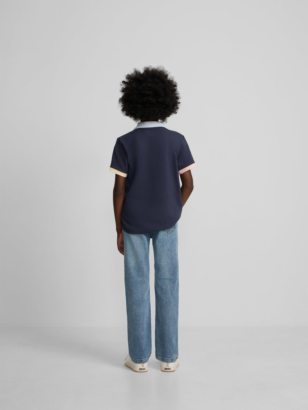 Polo enfant à liseré multicolore bleu marine