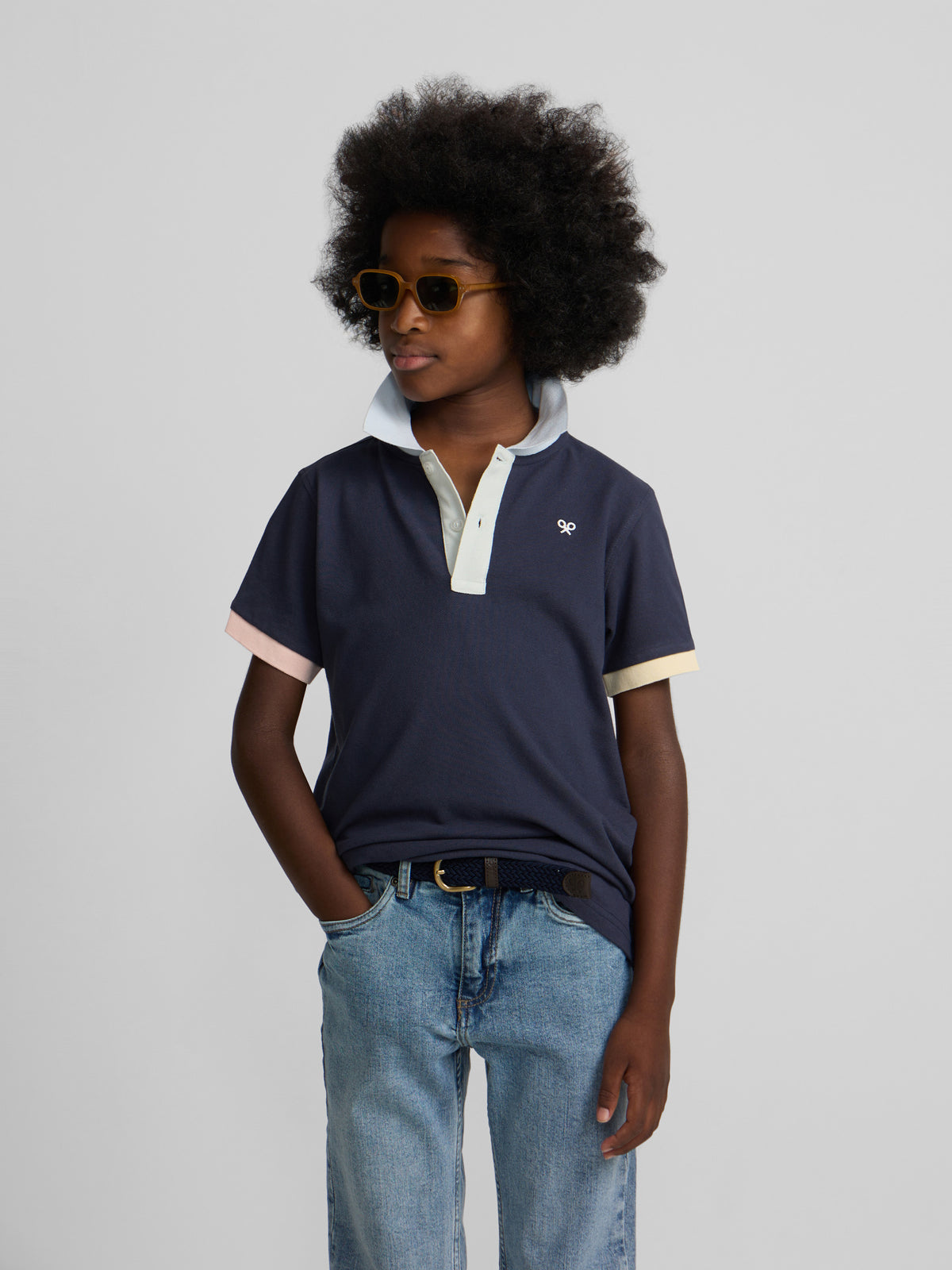 Polo kids ribete multicolor azul marino
