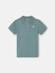 Polo kids liso logo rizo verde oscuro