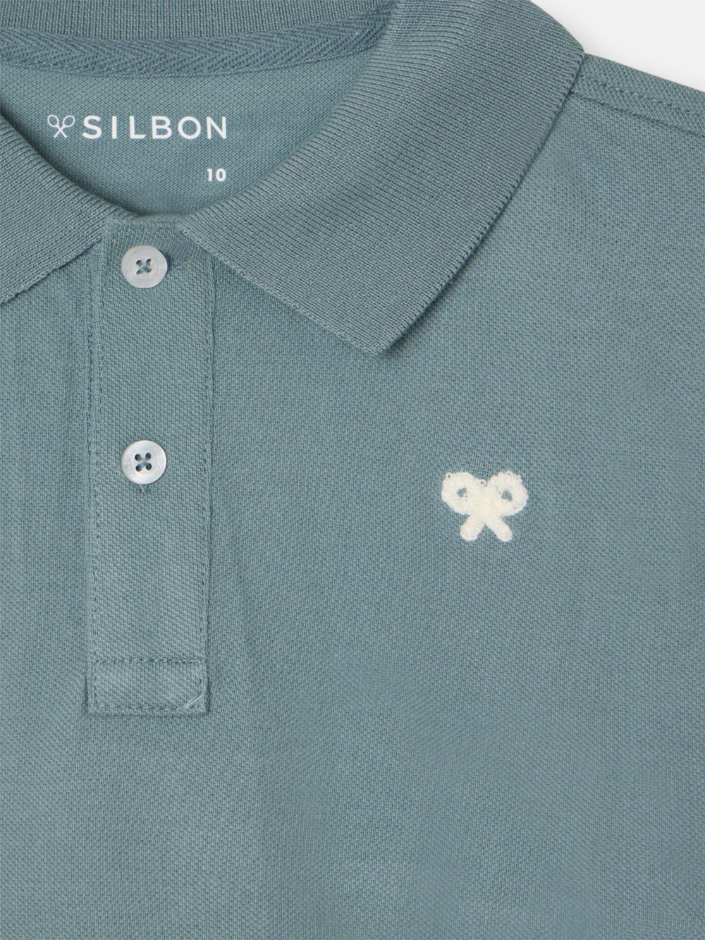 Polo kids liso logo rizo verde oscuro