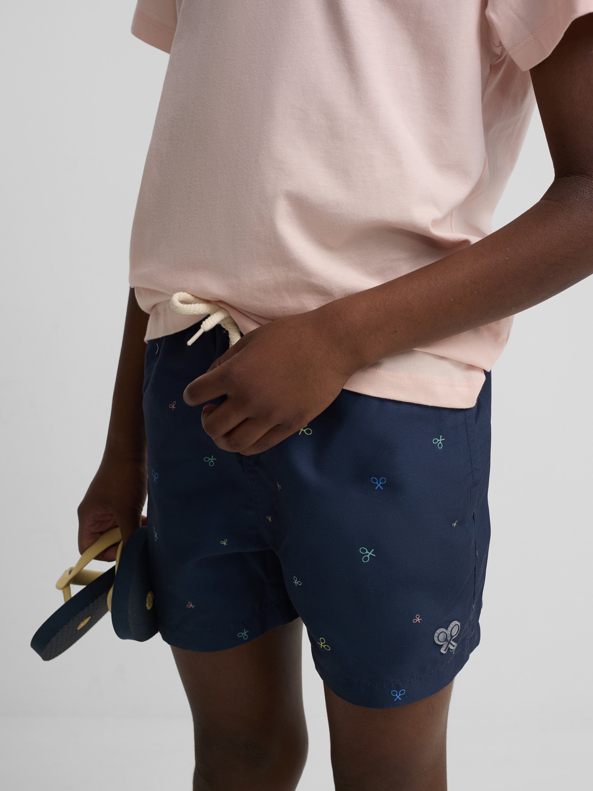 Kids swimsuit with multirackets in navy blue colors