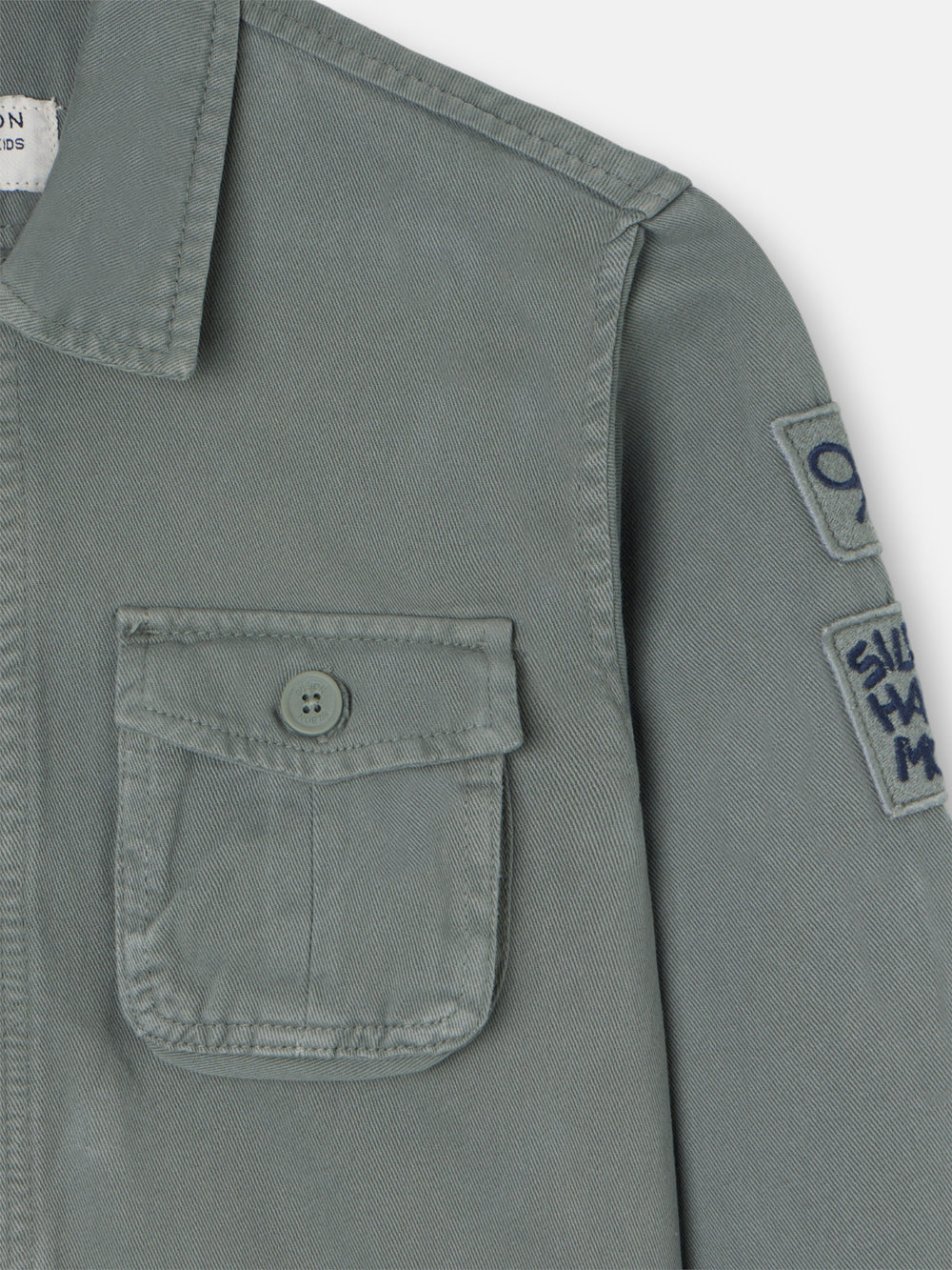 Kids jacket with patch pockets green