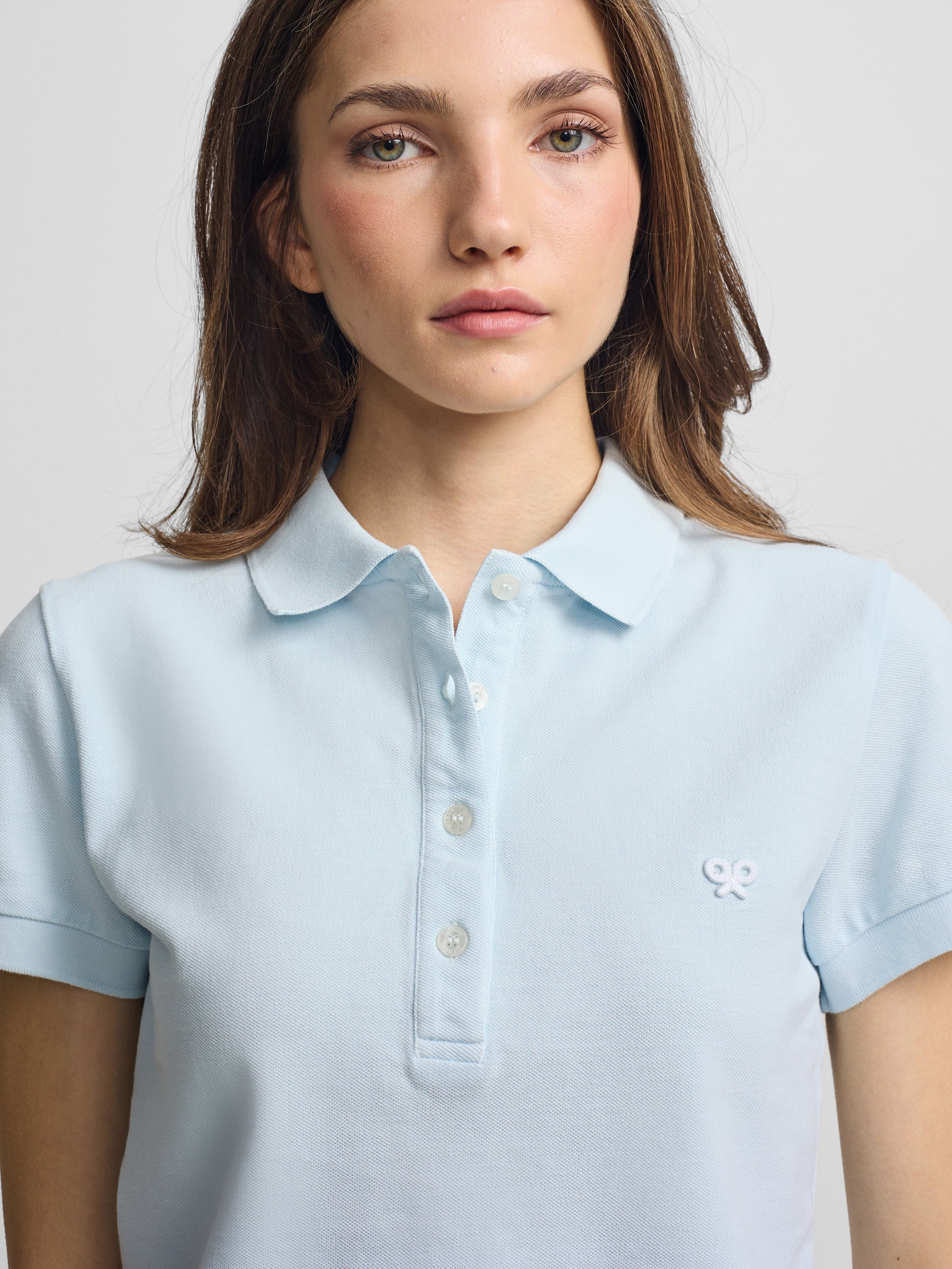 Classic light blue polo shirt for women