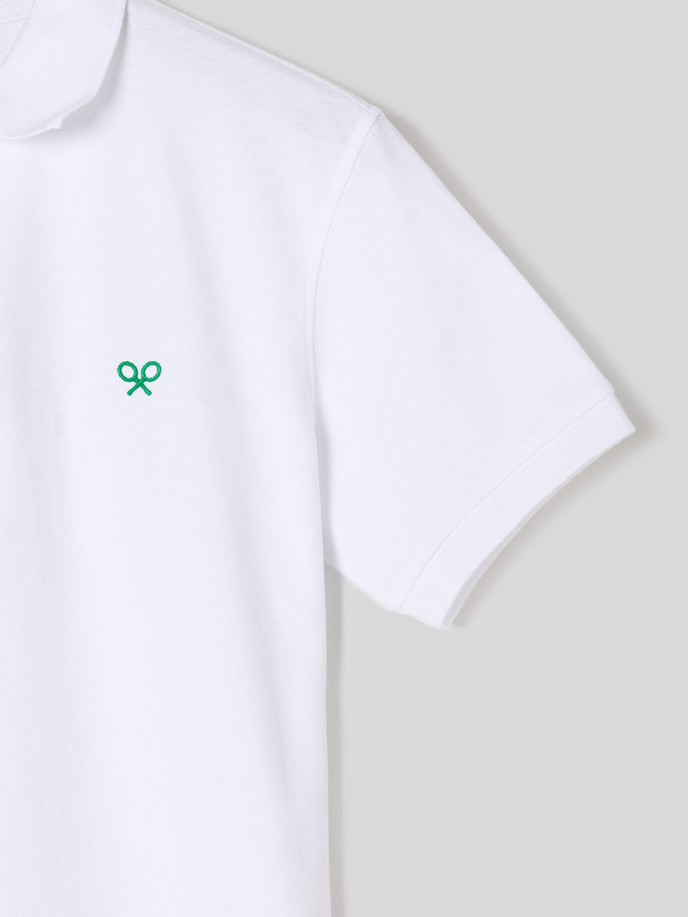 Polo raquete branco e verde
