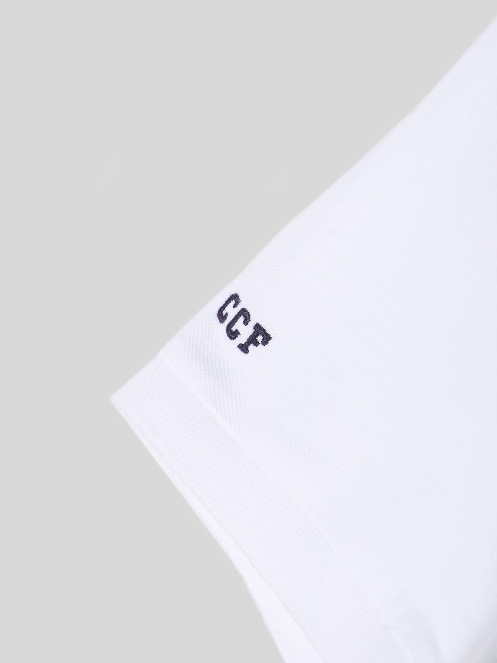 Polo raquete branco e verde